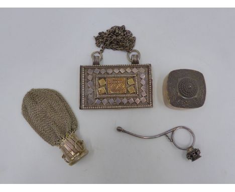 AN EASTERN WHITE METAL GHAO BOX TOGETHER WITH AN OPIUM FINGER PIPE, A SILVER TRINKET BOX AND A EXPANDING MESH PURSE. TOTAL WE