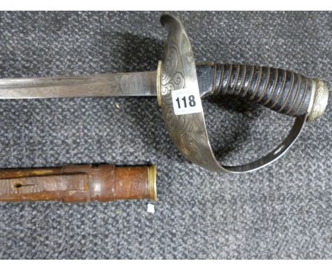 A 1912 PATTERN INFANTRY OFFICERS SWORD, SHARPENED FOR USE AND CONTAINED IN IT'S FIELD SERVICE SCABBARD.