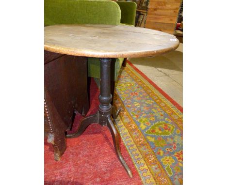 AN 18th.C.OAK COUNTRY TRIPOD TABLE.   D.59cms.