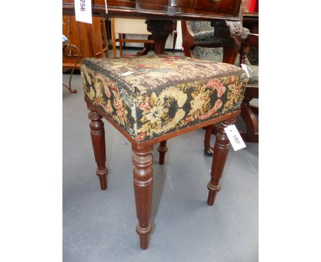 A REGENCY MAHOGANY STOOL WITH FLORAL NEEDLEPOINT SEAT AND RING TURNED TAPERED LEGS.TOGETHER WITH A VICTORIAN NEEDLEWORK PICTU