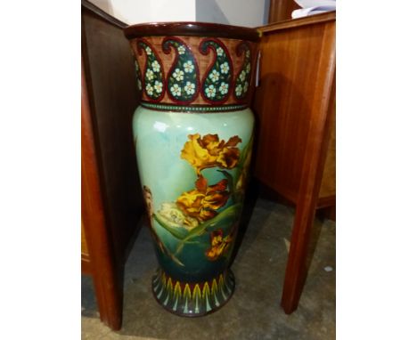 A VICTORIAN POTTERY UMBRELLA/STICK STAND. DECORATED WITH BIRDS AND FLOWERS. H.66cm.