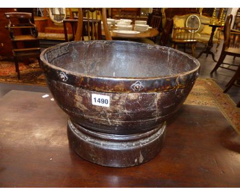 AN UNUSUAL EARLY TURNED BOWL WITH APPLIED BRASS LIP RING.   D.37cms.
