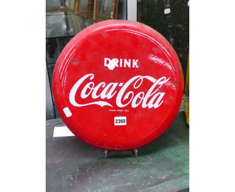 A RARE COCA COLA ENAMEL ADVERTISING PANEL.   36cms DIAMETER.