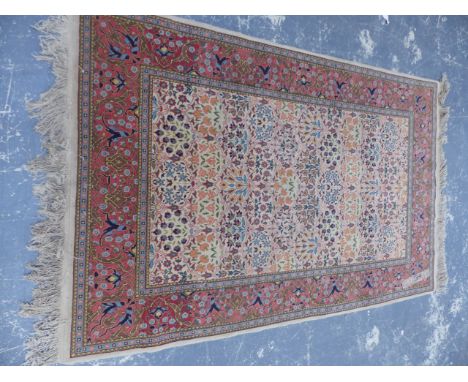 A PERSIAN RUG OF UNUSUAL TILE PATTERN DESIGN.   210x134cms.