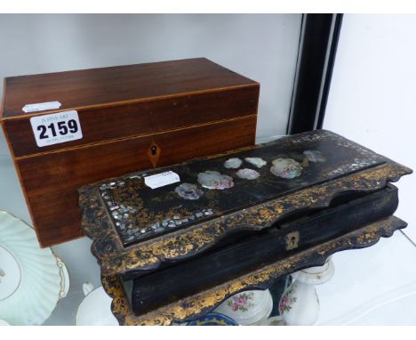 A GEORGIAN MAHOGANY TEA CADDY AND A PAPIER MACHE GLOVE BOX.