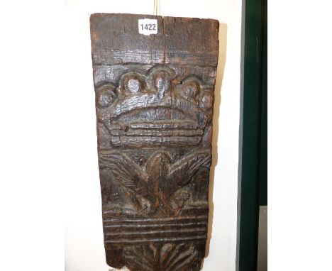 A 17th/18th.C.CARVED OAK ARCHITECTURAL ELEMENT WITH CROWN OVER AN EAGLE.   H.55cms.