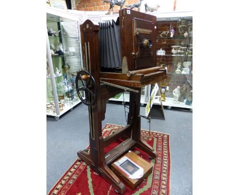 AN EARLY 20th.C.PHOTOGRAPHIC STUDIO PORTRAIT FULL PLATE CAMERA ON ADJUSTABLE STAND, LABELLED RAACO WITH M.ROUSSEL, PARIS, STY