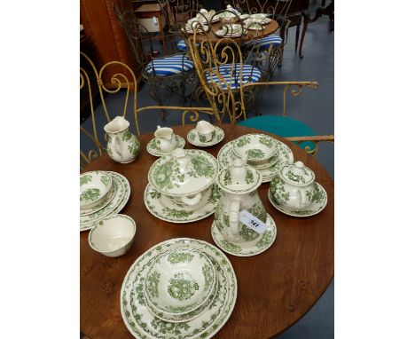 A MASON'S POTTERY FRUIT BASKET PATTERN PART DINNER SERVICE TO INCLUDE SERVING DISHES, TEA AND COFFEE PIECES,ETC.