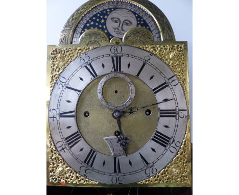 AN 18th.C.WALNUT CASED EIGHT DAY LONG CASE CLOCK WITH THREE TRAIN EIGHT  BELL CHIMING MOVEMENT. 12" ARCH BRASS DIAL WITH MOON