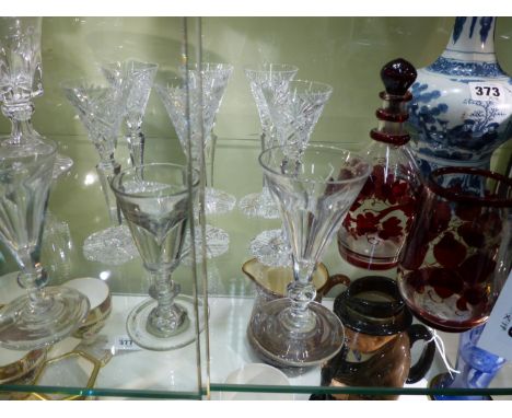 SIX CUT CRYSTAL TALL LIQUEURS   (H.14cms) TOGETHER WITH THREE VARIOUS WINE GLASSES AND TWO RUBY FLASHED PIECES.   (11)