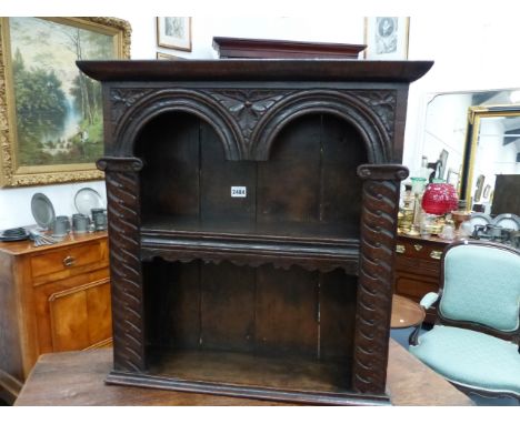 A SMALL 17th.C.AND LATER OAK NICHE WALL SHELF WITH CARVED ARCH DECORATION.   W.60 x H.62cms.