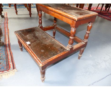 A 19th.C.MAHOGANY TWO TIER LIBRARY STEP WITH LEATHER INSETS ON RING TURNED SUPPORTS AND TAPERED LEGS.