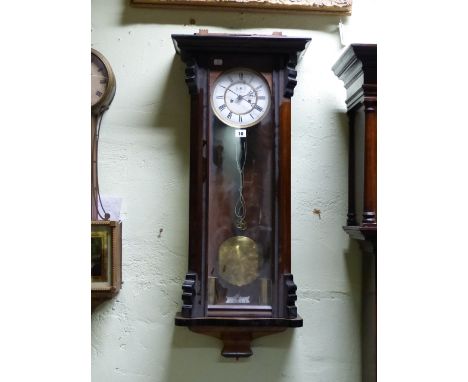 A VICTORIAN VIENNA WALL CLOCK IN MAHOGANY EBONISED CASE, WHITE ENAMEL TWO PIECE DIAL WITH SUBSIDIARY SECONDS, TWIN TRAIN GONG