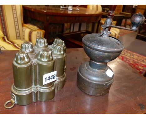 A 19th.C.COPPER SHAPED JELLY MOULD TOGETHER WITH AN IRON COFFEE GRINDER.