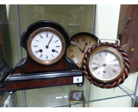 A SMALL VICTORIAN STRIKING MANTLE CLOCK IN EBONISED AND WALNUT CASE TOGETHER WITH A SMALL WALL CLOCK IN CARVED WALNUT ROPE TW