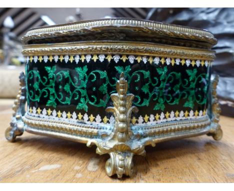 AN ANTIQUE FRENCH ENAMEL ORMOLU MOUNTED CARTOUCHE FORM DRESSER BOX, THE TOP DECORATED WITH OVAL FLORAL MEDALLION AND OVERALL 