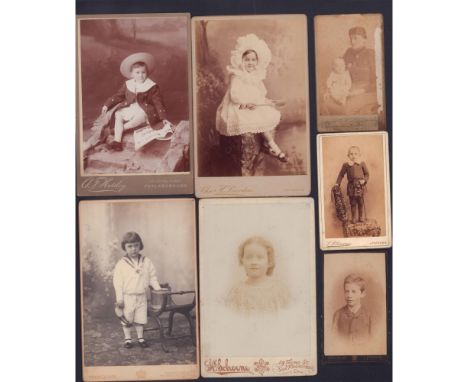 Interesting variety of portrait photographs on thick cardstock of children from the 1800s to early 1900s taken in England, Po
