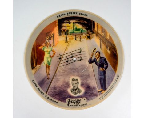 A disc featuring Basin Street Blues, and Sugar Blues on the reverse side. Depicts beautiful 1940s illustrations. Vogue the Pi