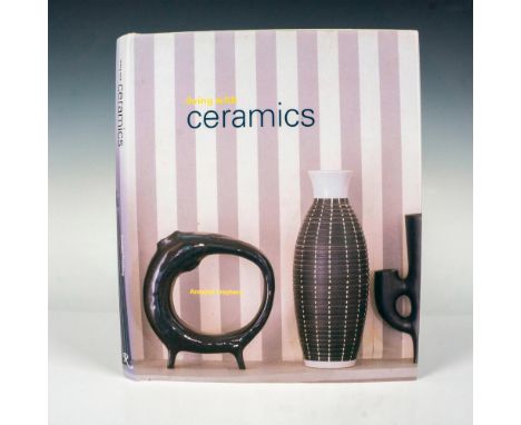 New York: Rizzoli International Publications, 1999. Hardcover book with dust jacket depicting a collection of black and white