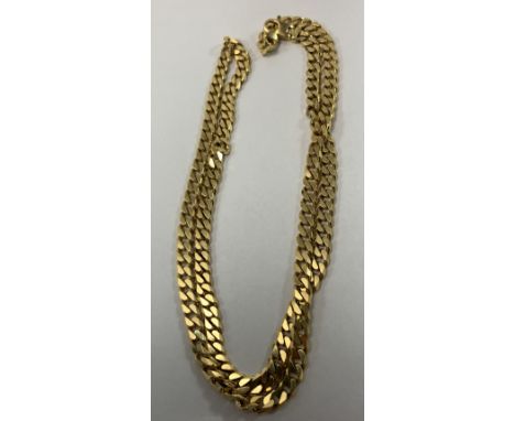 A 9 carat gold solid curb link chain, 28.9 g, 56 cm long CONDITION REPORTS Has some light surface scratching conducive with a