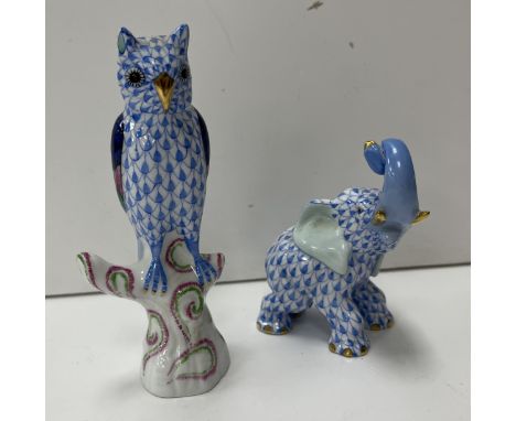 A Herend figure of an "Owl on a branch" in mainly blue colour way, 13.3 cm high, together with a similar figure, 9 cm high CO