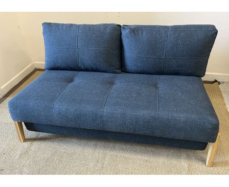 An Innovation Living Cubed 140 two seater sofa bed in Nist blue, as sofa 143 cm wide x 100 cm deep x 67 cm high   CONDITION R