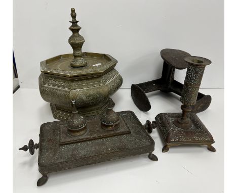 An Indonesian brass Tepak Siriah betel box of octagonal form with baluster body on an octagonal foot approx. 23.5 cm diameter