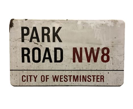 An enamelled steel street sign for Park road NW8  City of Westminster with iconic black and red sans serif lettering first cr