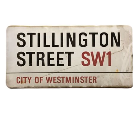An enamelled steel street sign for Stillington Street SW1, City of Westminster with iconic black and red sans serif lettering