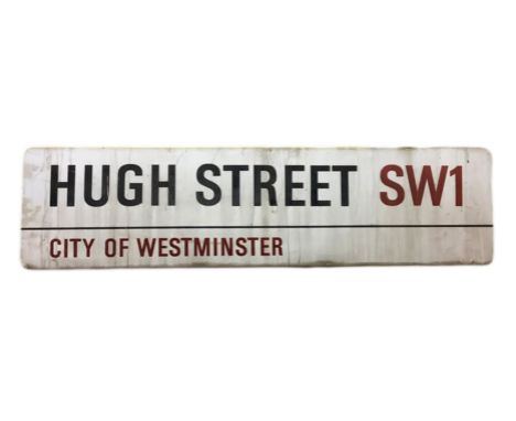 An enamelled steel street sign for Hugh Street SW1,  City of Westminster with iconic black and red sans serif lettering first