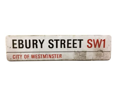 An enamelled steel street sign for Ebury Street SW1, City of Westminster with iconic black and red sans serif lettering first