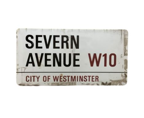 An enamelled steel street sign for Severn Avenue W10, City of Westminster with iconic black and red sans serif lettering firs