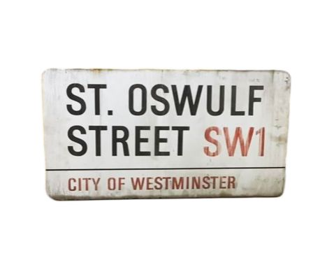 An enamelled steel street sign for St. Oswulf Street SW1 City of Westminster with iconic black and red sans serif lettering f