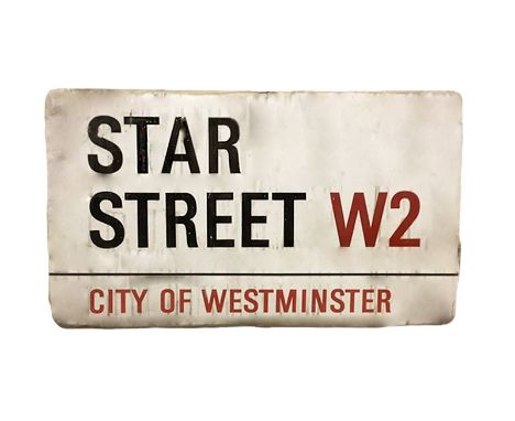 An enamelled steel street sign for Star Street W2, City of Westminster with iconic black and red sans serif lettering first c