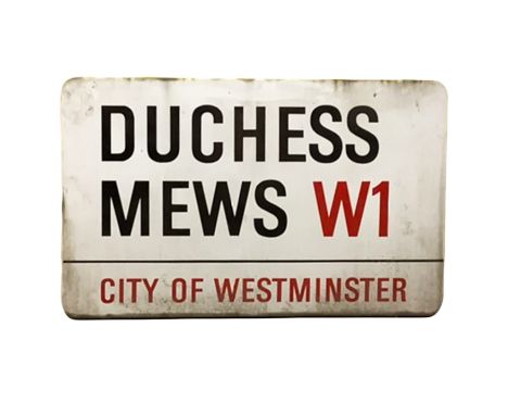 An enamelled steel street sign for Duchess Mews W1, City of Westminster with iconic black and red sans serif lettering first 