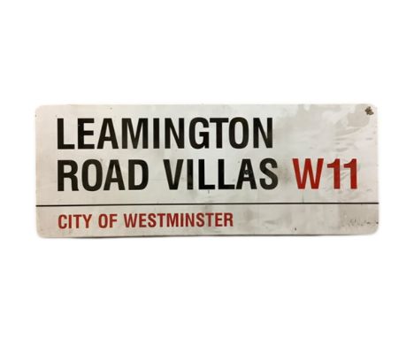 An enamelled steel street sign for Leamington Road Villas W11, City of Westminster with iconic black and red sans serif lette