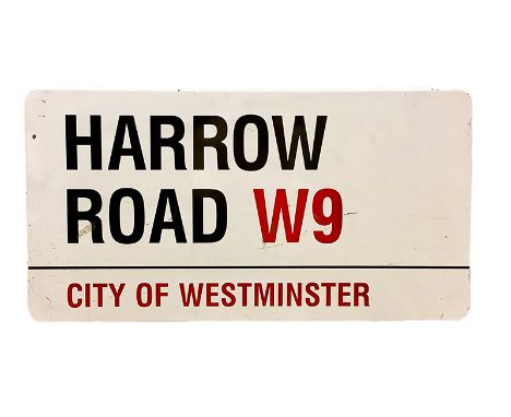 An enamelled steel street sign for Harrow Road W9, City of Westminster with iconic black and red sans serif lettering first c