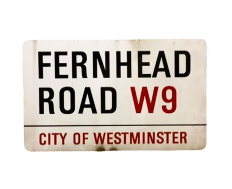An enamelled steel street sign for Fernhead Road W9, City of Westminster with iconic black and red sans serif lettering first