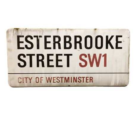 An enamelled steel street sign for Esterbrooke Street SW1, City of Westminster with iconic black and red sans serif lettering
