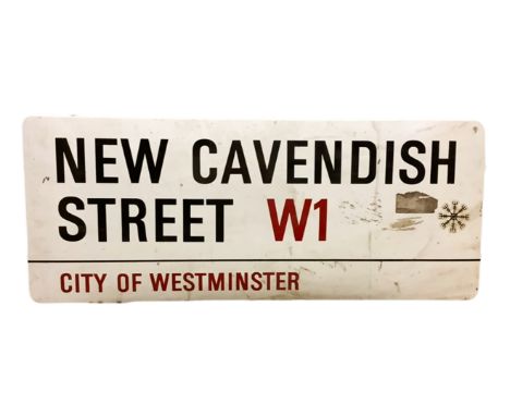 An enamelled steel street sign for New Cavendish Street W1, City of Westminster with iconic black and red sans serif letterin