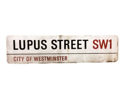 An enamelled steel street sign for Lupus Street SW1, City of Westminster with iconic black and red sans serif lettering first