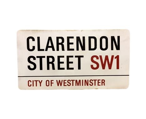 An enamelled steel street sign for Clardendon Street SW1, City of Westminster with iconic black and red sans serif lettering 