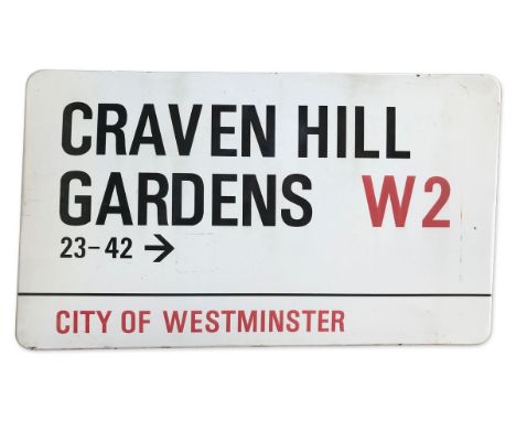 An enamelled steel street sign for Craven Hill Gardens 23-42 W2, City of Westminster with iconic black and red sans serif let