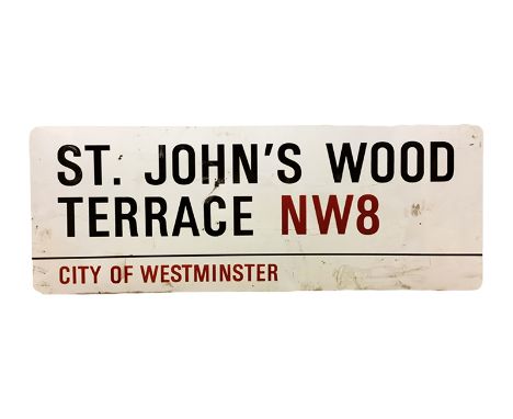 An enamelled steel street sign for St. John's Wood Terrace NW8, City of Westminster with iconic black and red sans serif lett