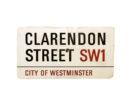 An enamelled steel street sign for Clardendon Street SW1, City of Westminster with iconic black and red sans serif lettering 