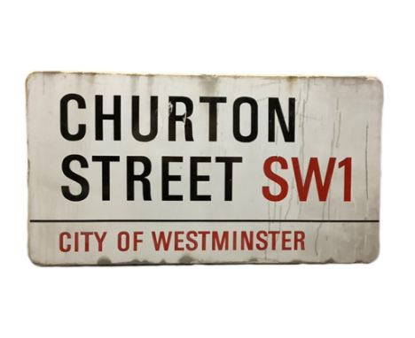 An enamelled steel street sign for Churton Street SW1, City of Westminster with iconic black and red sans serif lettering fir