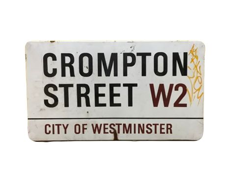 An enamelled steel street sign for Crompton Street W2, in metal Brackets,  City of Westminster with iconic black and red sans