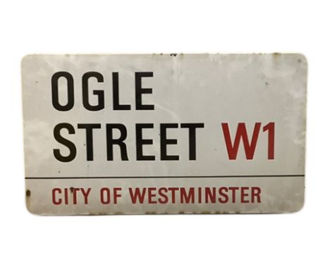 An enamelled steel street sign for Ogle Street W1, City of Westminster with iconic black and red sans serif lettering first c
