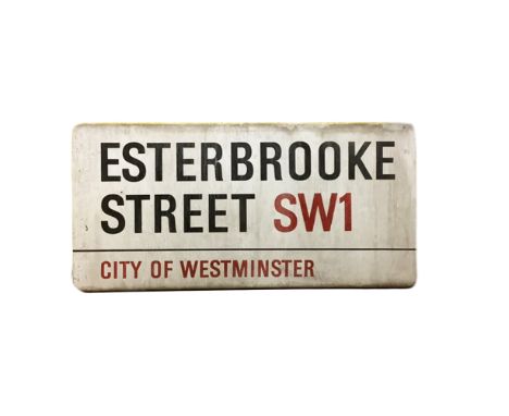 An enamelled steel street sign for Esterbrooke Street SW1, City of Westminster with iconic black and red sans serif lettering