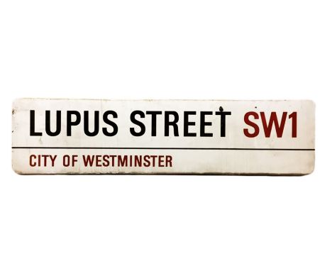 An enamelled steel street sign for Lupus Street SW1,  City of Westminster with iconic black and red sans serif lettering firs